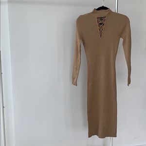 Long sleeve cream/brown dress.